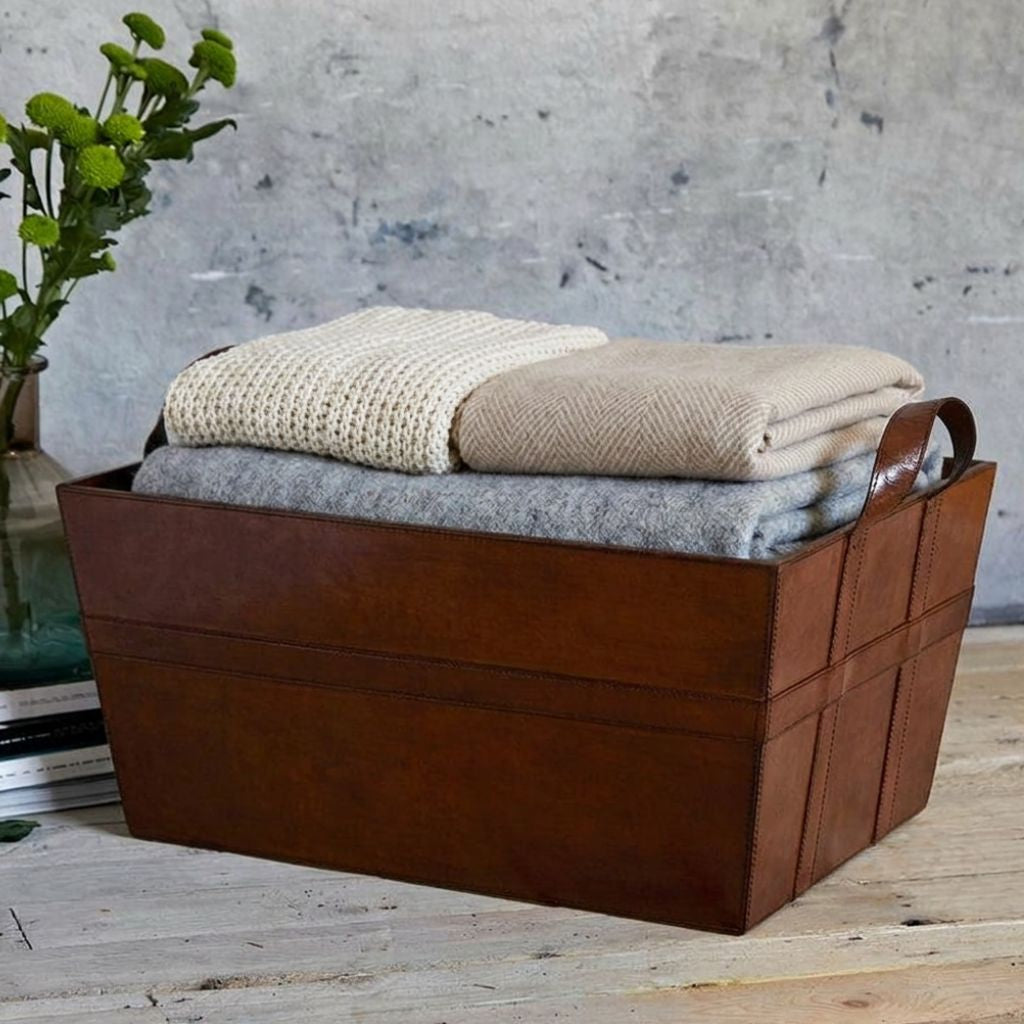 Conker brown leather two handled basket with blankets in