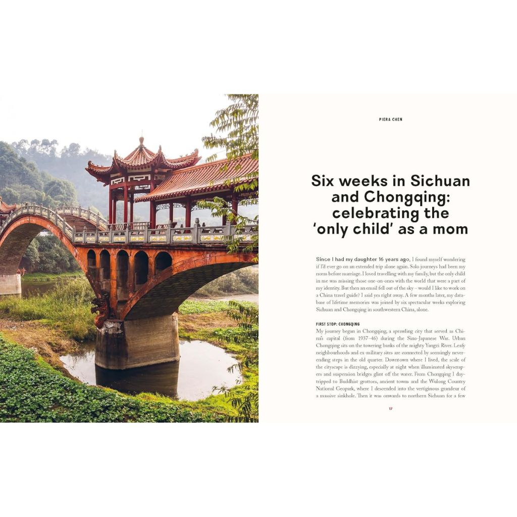 Traditional Chinese bridge over a river with greenery in the background