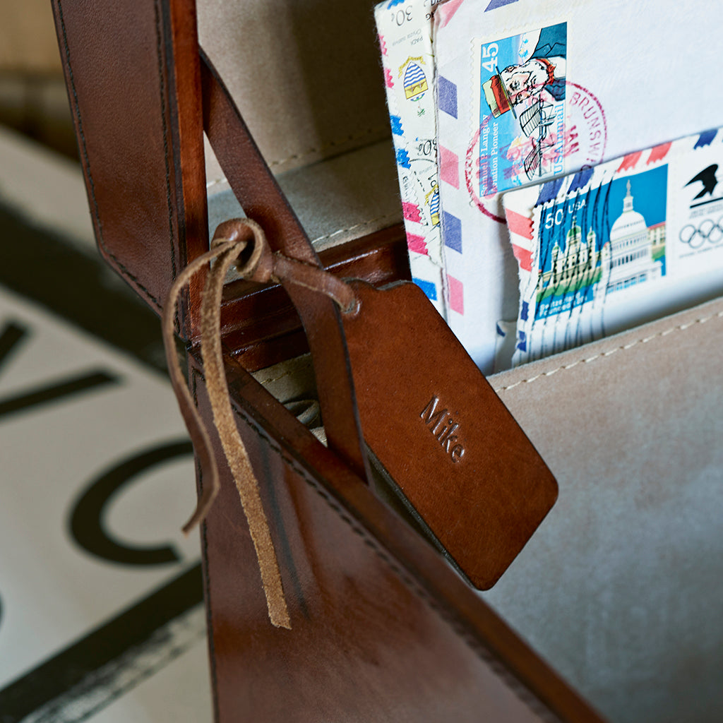 Leather memory box with personalised leather mini tag with name