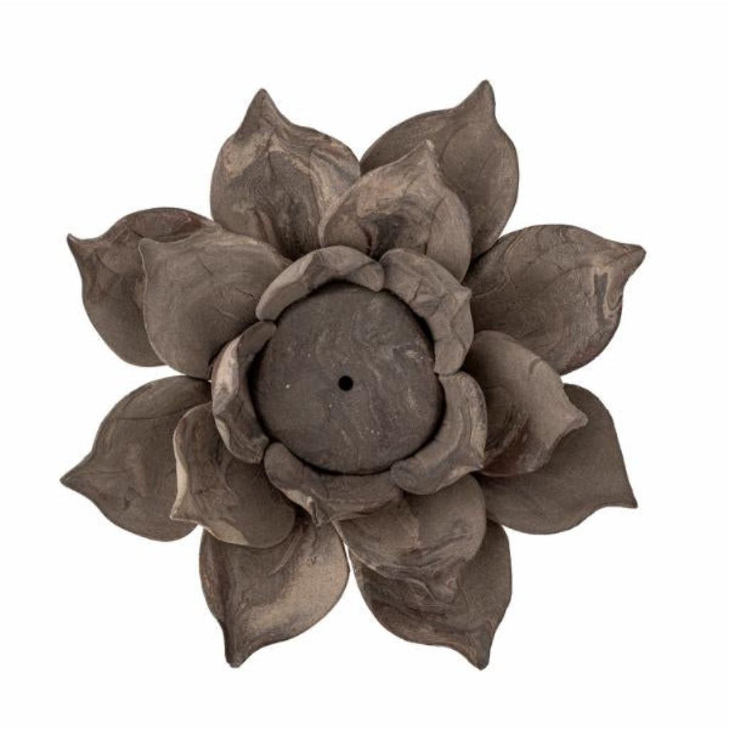 Decorative votive resembling a flower with a brown finish on a white background