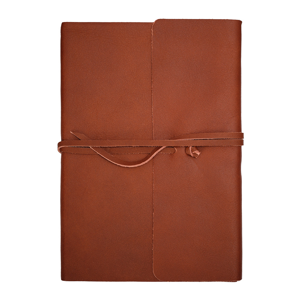 Brown leather notebook with a strap on a white background