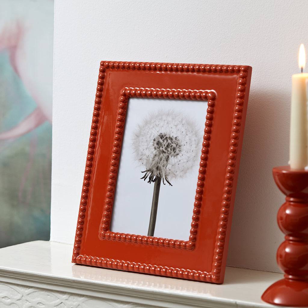 Orange bobbin picture frame