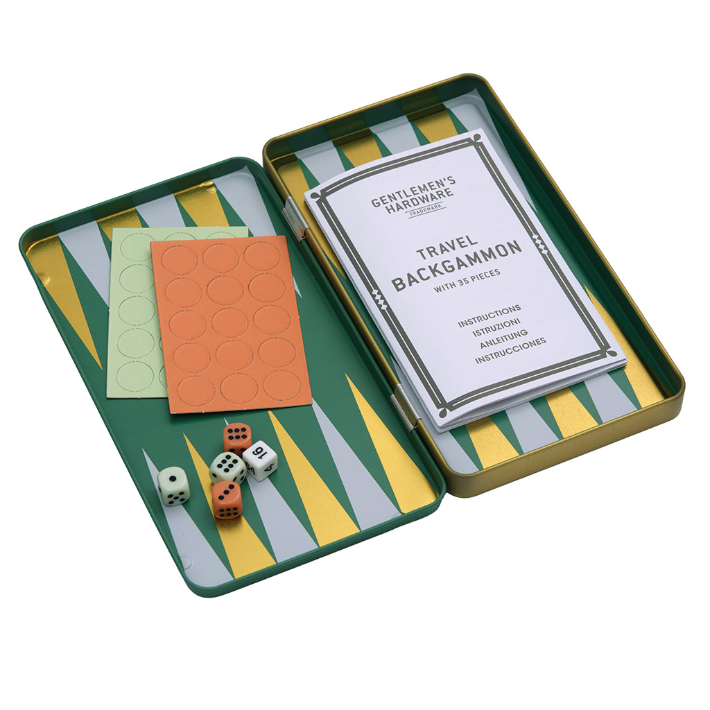 Travel backgammon set with instructions in a green and yellow striped tin