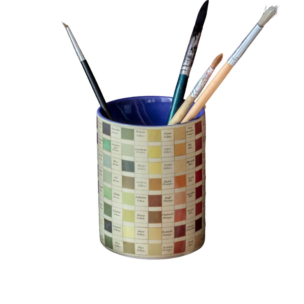Colour swatch pencil holder with paintbrushes on a white background