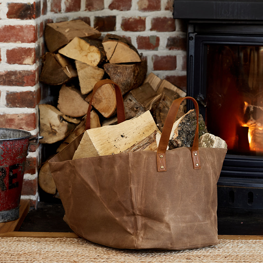 waxed cnavs and leather handled log bag