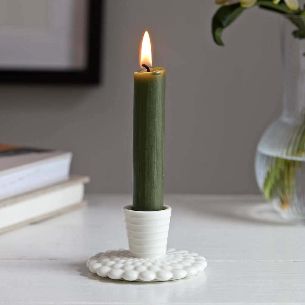 white candle stick holder